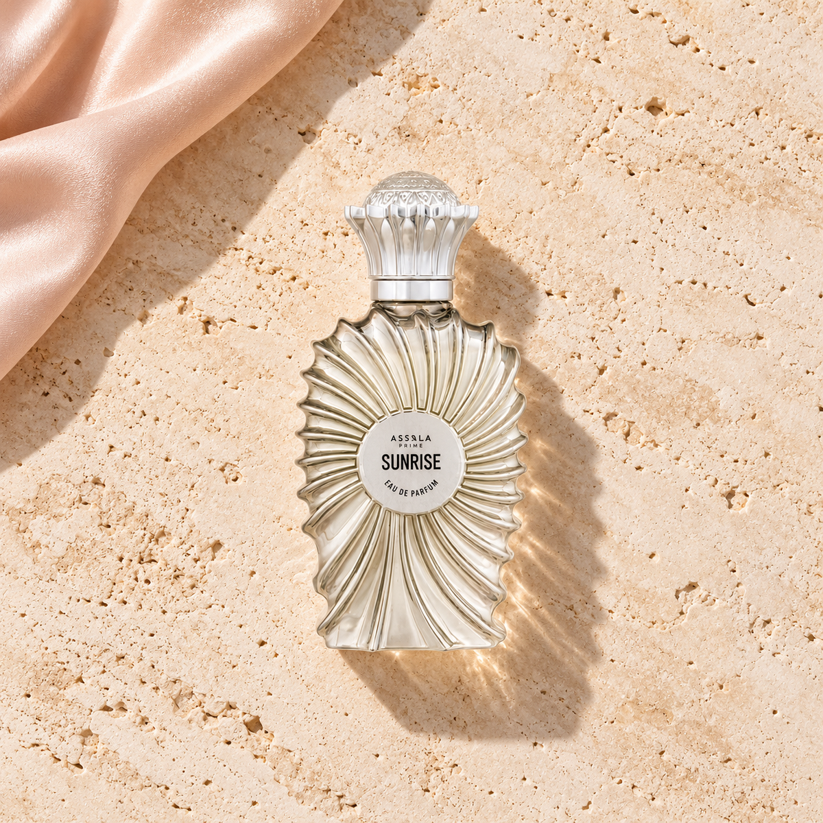 Assala Prime Sunrise 100 ml – parfém v prostředí, pohled shora s bočním stínem