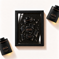 Parfemovy obraz Bvlgari Man In Black Parfum v cernem ramu - ilustracni fotografie